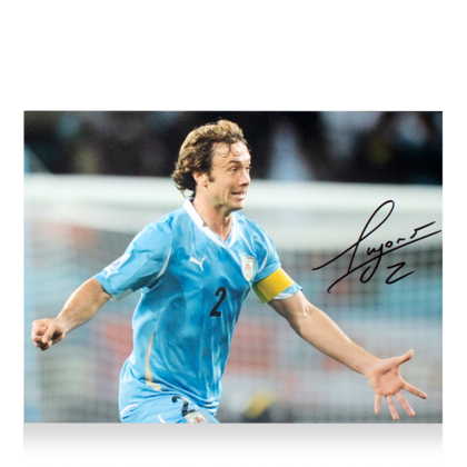 Diego Lugano gesigneerde Uruguay foto