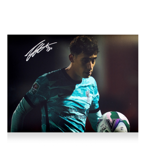 Icons Konstantinos Tsimikas gesigneerde Liverpool FC foto