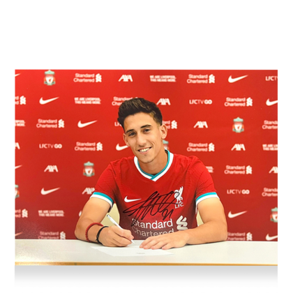Kostas Tsimikas gesigneerde Liverpool FC foto