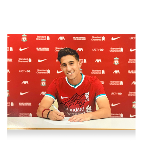 Icons Kostas Tsimikas gesigneerde Liverpool FC foto