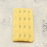 Op en Top Beha Verlenger 4 Haaks Geel (per stuk) Op en Top Beha Verlenger 4 Haaks Geel (per stuk)