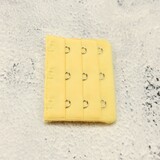 Op en Top Beha Verlenger 3 Haaks Geel (per stuk) Op en Top Beha Verlenger 3 Haaks Geel (per stuk)