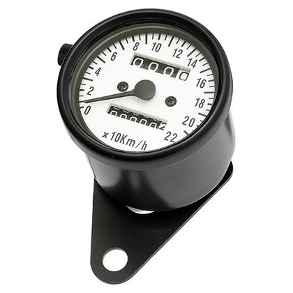 Zwarte mini snelheidsmeter met witte wijzerplaat.