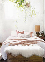 A look inside the bedroom of the beautiful Aurora James featured on the cover of domino magazine.