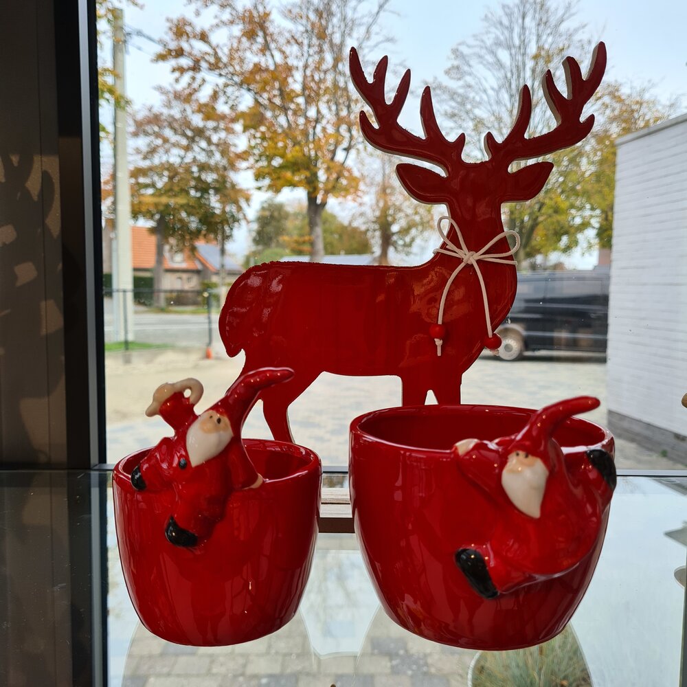 Keramieken potje met zwaaiende kerstman. Keramieken potje met zwaaiende kerstman.