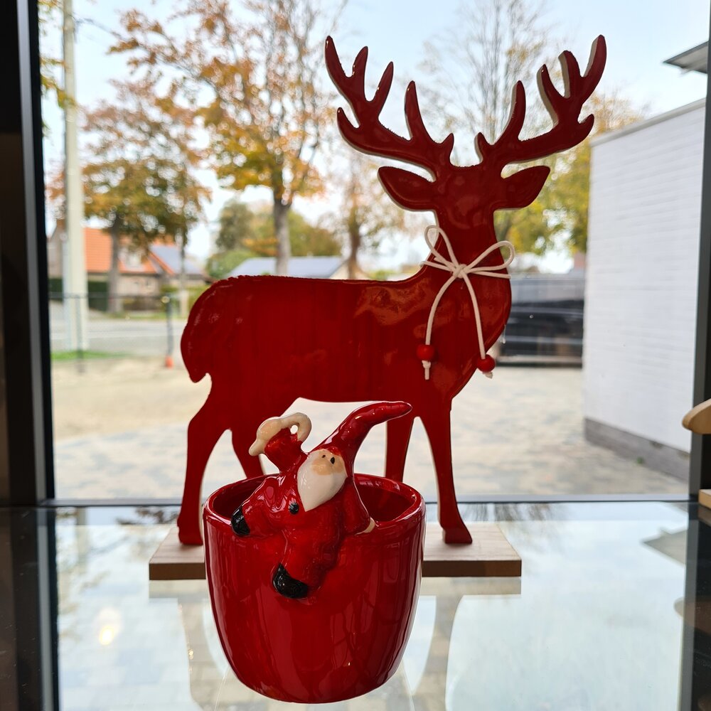 Keramieken potje met zwaaiende kerstman. Keramieken potje met zwaaiende kerstman.