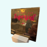Gouden tegel – “Superjuf" Gouden tegel – “Superjuf"