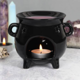 Zwarte ketel Halloween-oliebrander en wasverwarmer Zwarte ketel Halloween-oliebrander en wasverwarmer