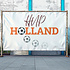 Hup Holland spandoek in een voetbal thema gecombineerd met oranje tekst
