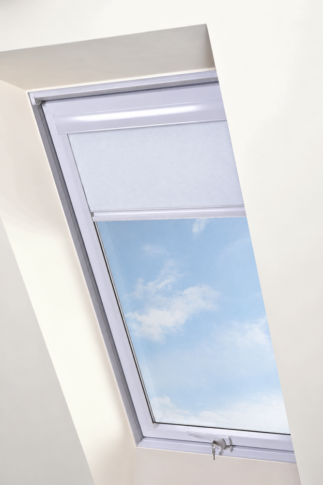 Intura Multistop roller blind with white aluminium frame for plastic skylights