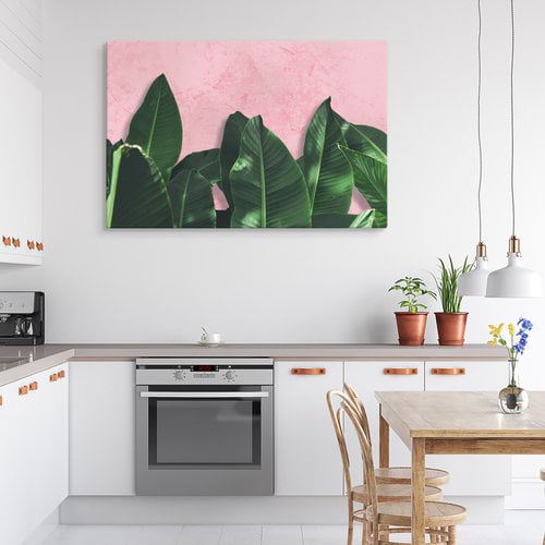 Schilderij - Bananenblad op roze achtergrond, 4 maten, premium print