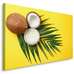 Schilderij - Kokosnoot en blad op gele achtergrond, Premium print Schilderij - Kokosnoot en blad op gele achtergrond, Premium print