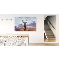 Schilderij - Hert in de besneeuwde Bergen, Premium print