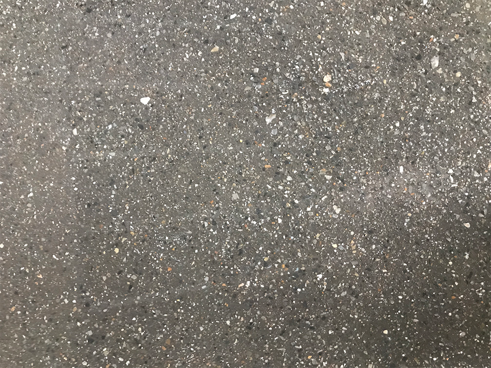 Wine storage with exposed aggregate concrete
