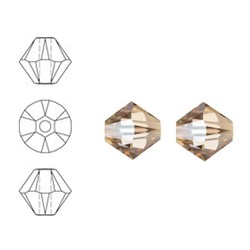 SWAROVSKI ELEMENTS Konisch Geslepen Glaskraal. 6mm. Xilion Bead Crystal Golden Shadow.