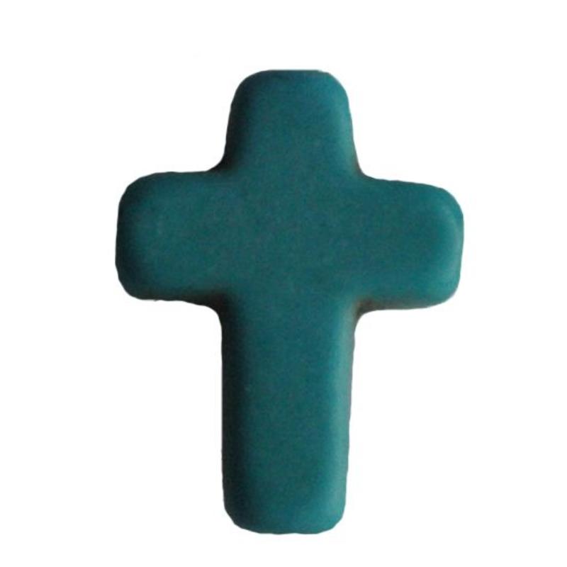 Kruis Howlite dyed Turquoise. Rijggat middendoor. 13x15mm.