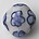 Delftsblauwe Porseleinkraal. Plat met bloemen. 17mm.