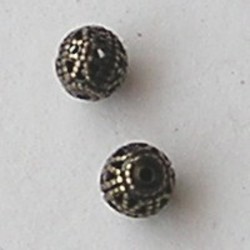 Bronskleurige Filligrainkraal. 6mm.