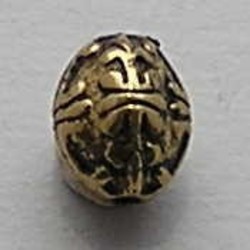 Bewerkte Kraal. 7x10mm. Ovaal. Goudkleurig. (metallook)