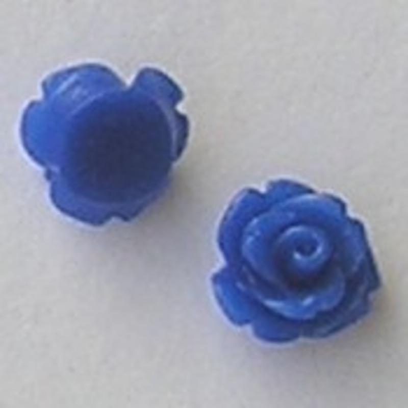 Kunststof bloemetje met platte onderkant. Kobaltblauw. 10mm. Leuk als cabochon te gebruiken.