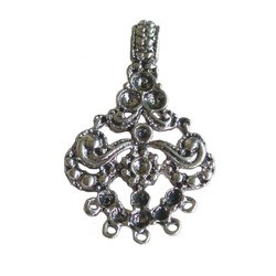 Metal openwork pendant 44 x 28mm. Silver-colored