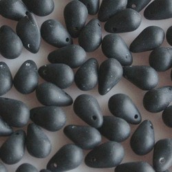 Glass bead drop. 5x7mm. The matt black hole sits at the top of the bead. 100 pieces for.