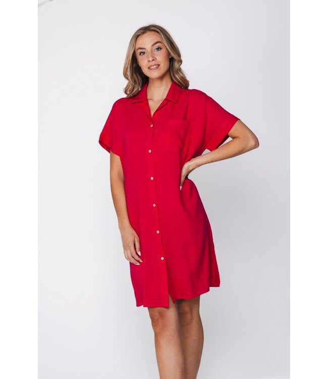 fuschia pink short sleeve full button woven beach shirt sunny day