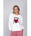 Rode pyjama met french terry top en kangoeroe zak True Love