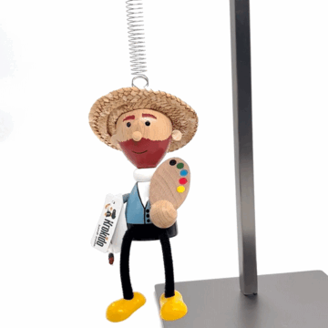 Houten pop Van Gogh met veer