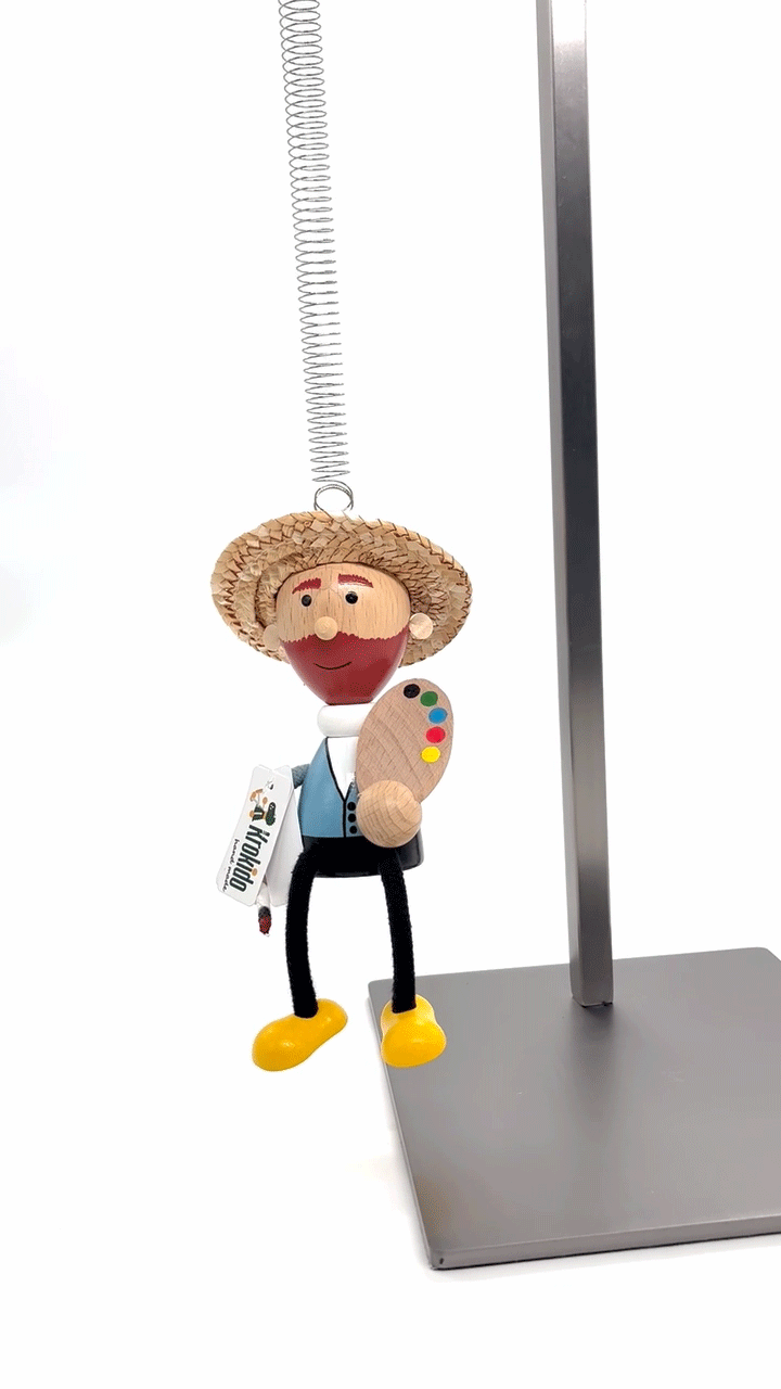 Houten pop Van Gogh met veer