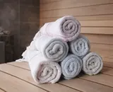 Hoeveel handdoeken neem je mee naar de sauna?