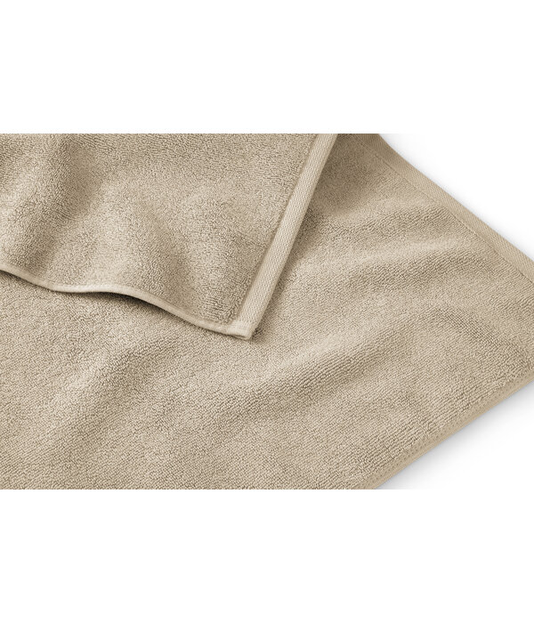 Schlossberg badmattenlijn Coshmere sand GOTS biologisch katoen