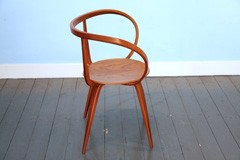 Pretzel Chair with armrests by George Nelson