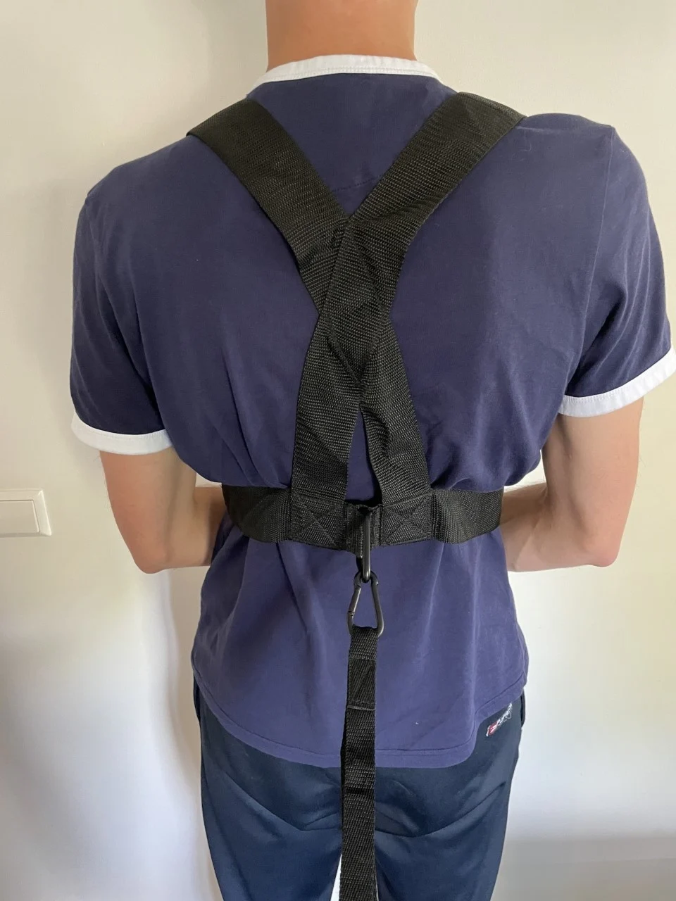 Weerstandsharnas met schoudergordels