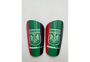 Scheenbeschermers met clublogo en sleeves