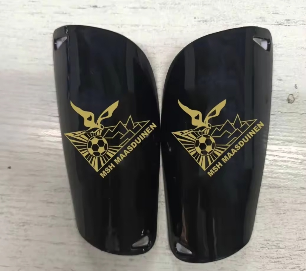 Scheenbeschermers met clublogo