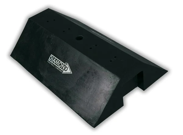 Verzwaarde voet voor vrije trap pop op kunstgras