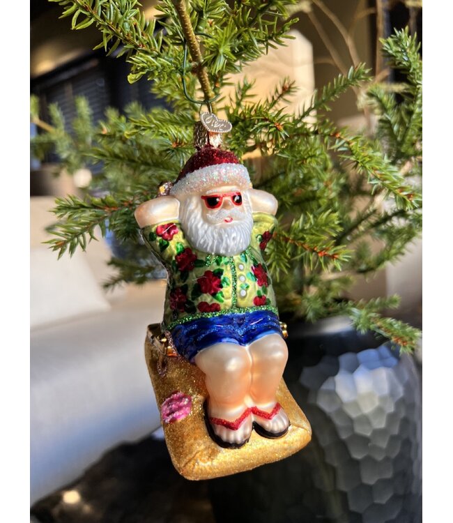 Old World Christmas Papá Noel tomando el sol | Decoración navideña