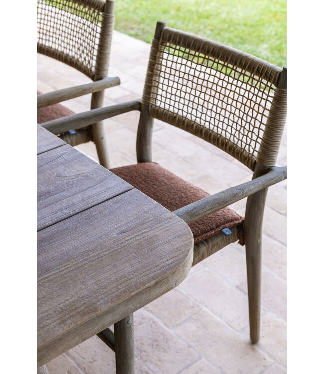GOMMAIRE Outdoor Meubels | Organic Living Stackable Armchair Mieke | Teak Natural Grey / PE Wicker Sand