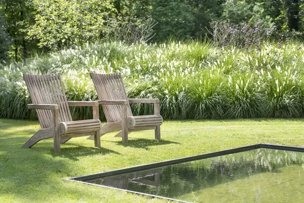 GOMMAIRE - Organic Living - Design Furniture Lenestol Orso | Teak Naturgrå GOMMAIRE - Organic Living - Design Furniture Lenestol Orso | Teak Naturgrå