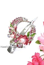 Zilver duckklem met roze bloem en roze strass stenen