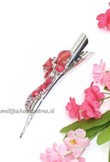 Zilver duckklem gedecoreerd met roze stenen & strass stenen