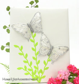 Ivoor gastenboek met zilver vlinders