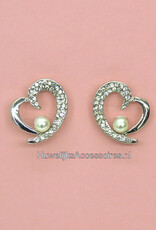 Oorbellen versierd met strass steentjes met parels