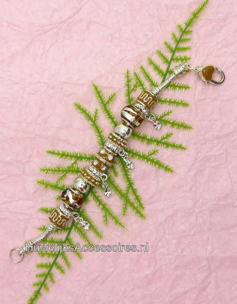 Zilver armband met amber en zilver kralen