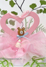 Taarttopper met roze hartje met een beertje