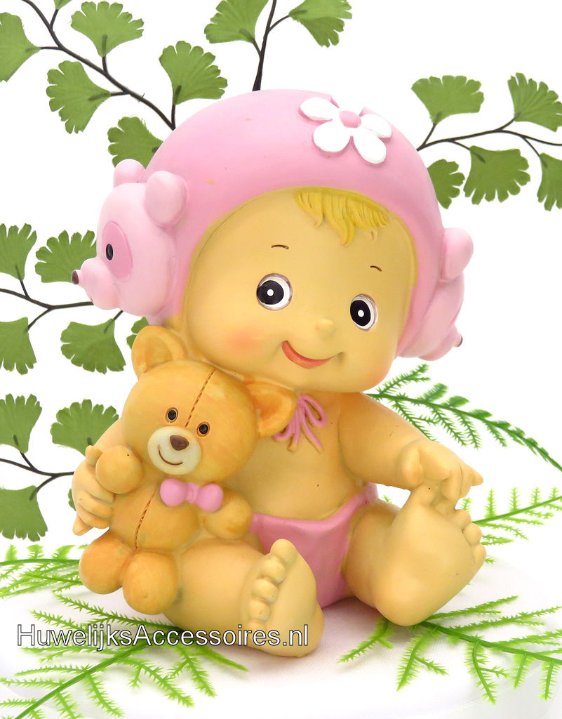 Geboorte taarttopper baby meisje zit met een knuffel