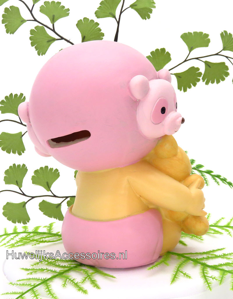 Geboorte taarttopper baby meisje zit met een knuffel