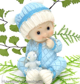Baby jongetje in blauwe pyjama