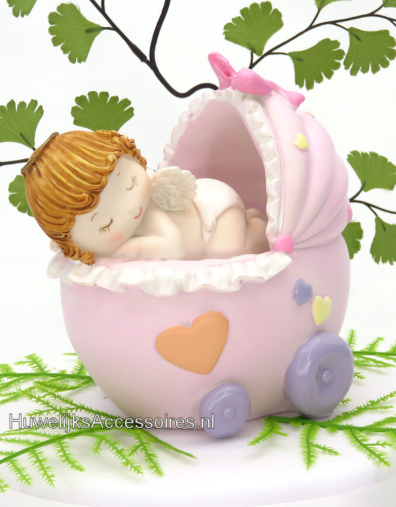 Slappende baby meisje in roze wieg spaarpot